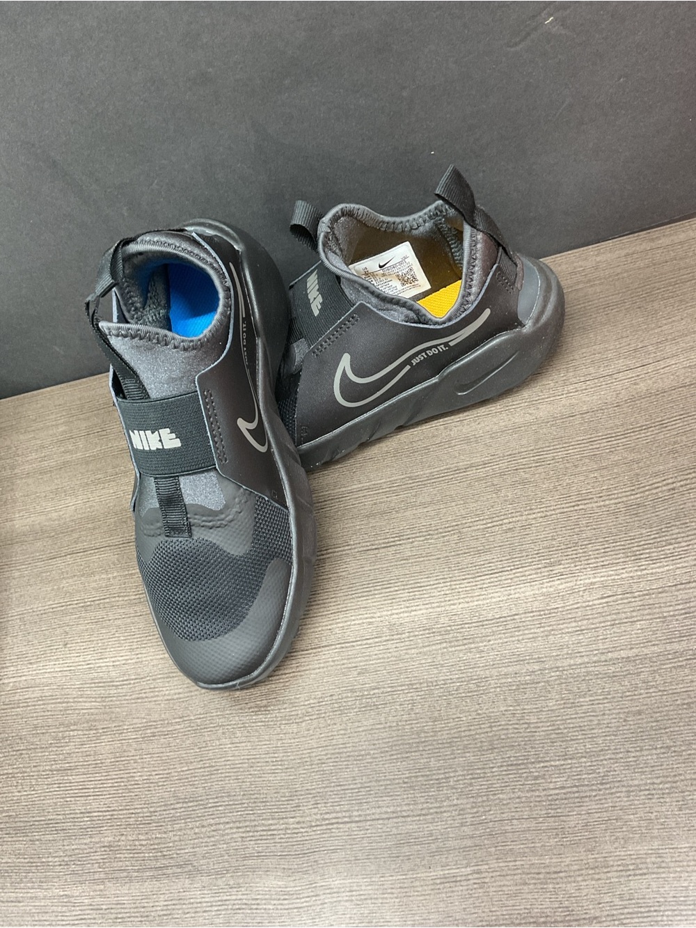Nike Kids Black Slip-On Sneakers with Grey Swoosh